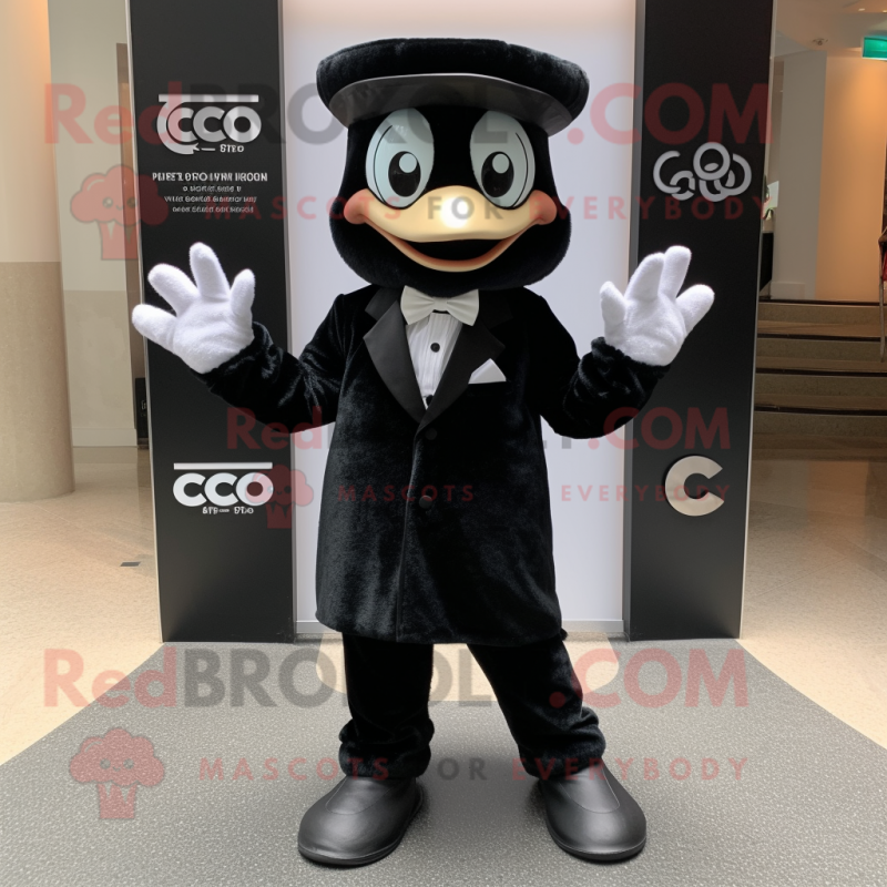 Black Ceviche mascot costume character dressed with a Tuxedo and Foot pads Black Ceviche mascot costume character dressed with a Tuxedo and Foot pads