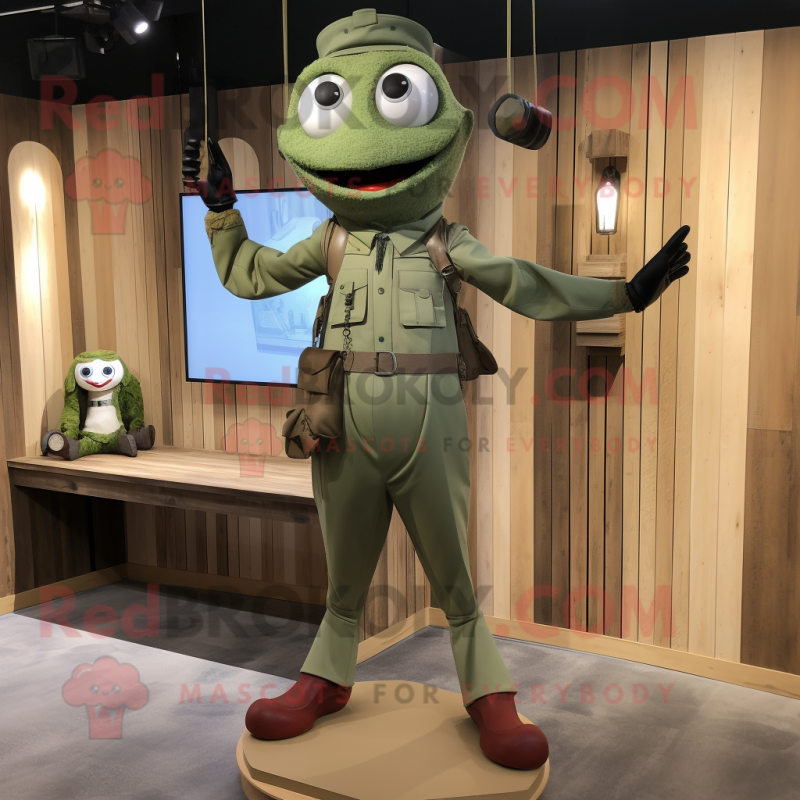 Olive Trapeze Artist mascot costume character dressed with a Chinos and Smartwatches Olive Trapeze Artist mascot costume character dressed with a Chinos and Smartwatches