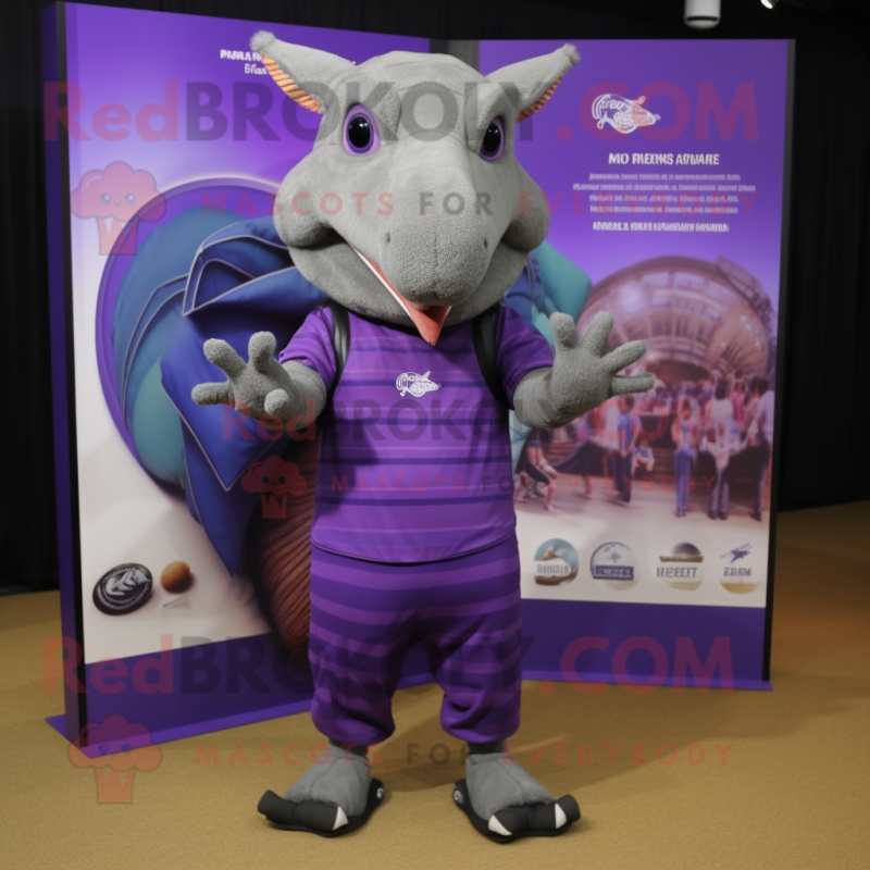 Purple Armadillo mascot costume character dressed with a Polo Tee and Shoe clips Purple Armadillo mascot costume character dressed with a Polo Tee and Shoe clips