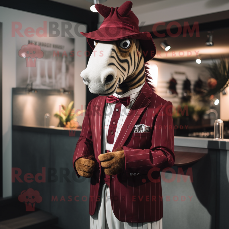 Maroon Quagga mascot costume character dressed with a Blazer and Hats Maroon Quagga mascot costume character dressed with a Blazer and Hats