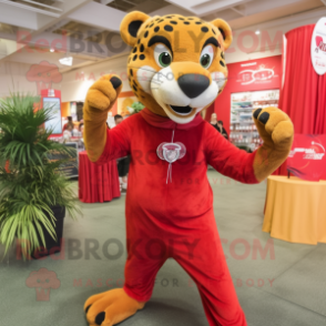 Red Cheetah mascot costume character dressed with a Polo Tee and Shawl pins