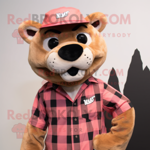 Pink Mountain Lion mascot costume character dressed with a Flannel Shirt and Hats