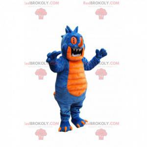 Blauw en geel monster mascotte met psychedelische ogen -