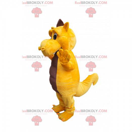 Mascotte de dinosaure jaune et marron tout triste -