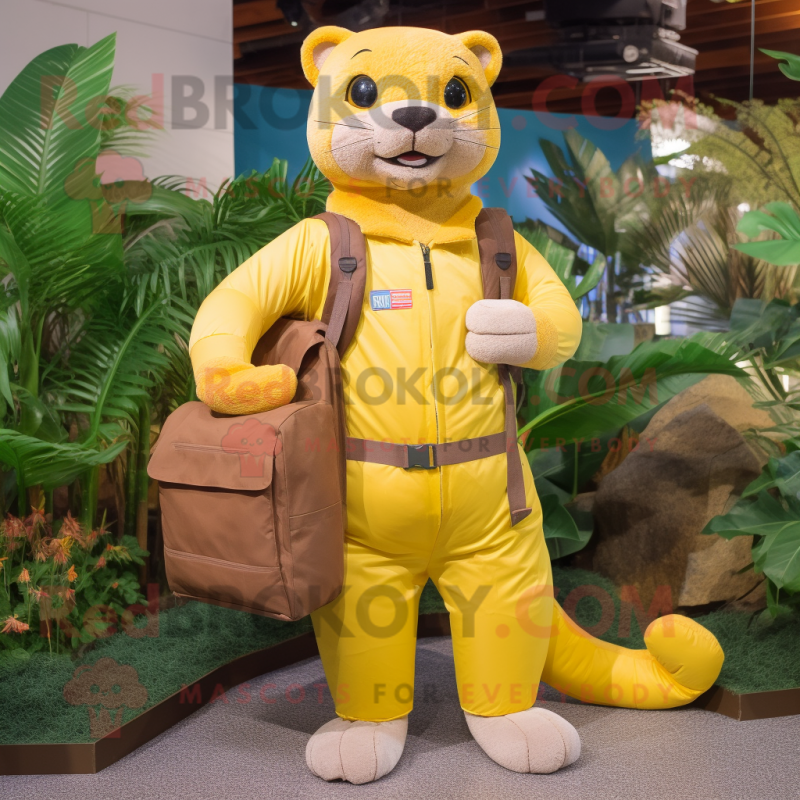 Yellow Jaguarundi mascot costume character dressed with a Cargo Pants and Messenger bags