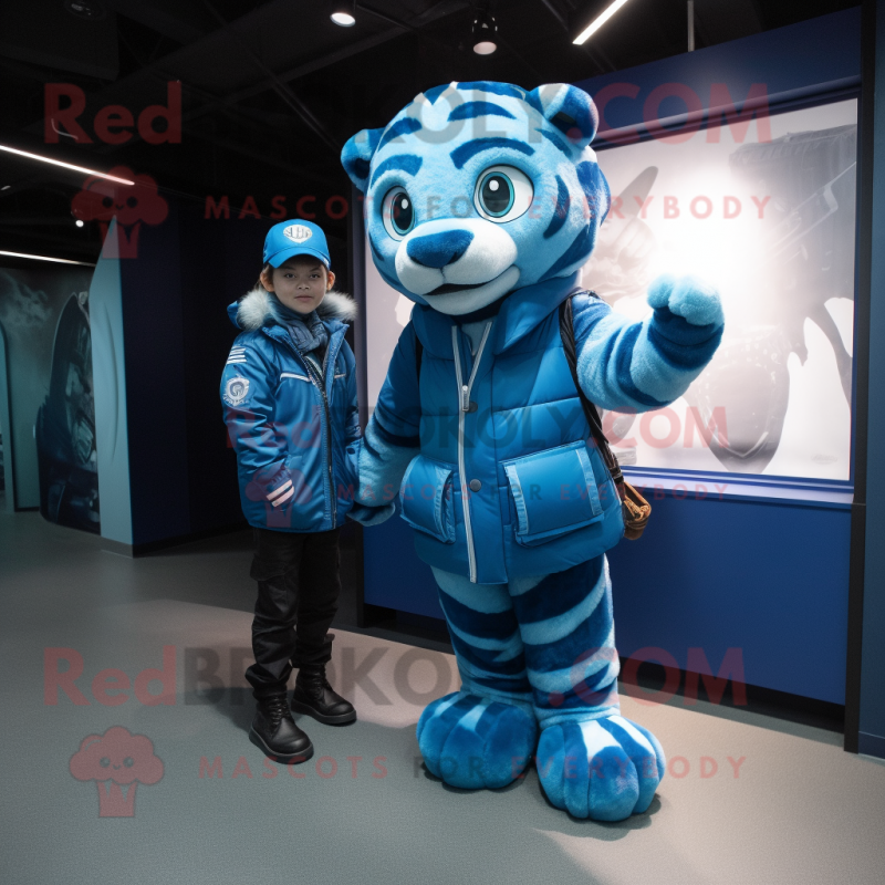 Blue Tiger mascot costume character dressed with a Parka and Watches