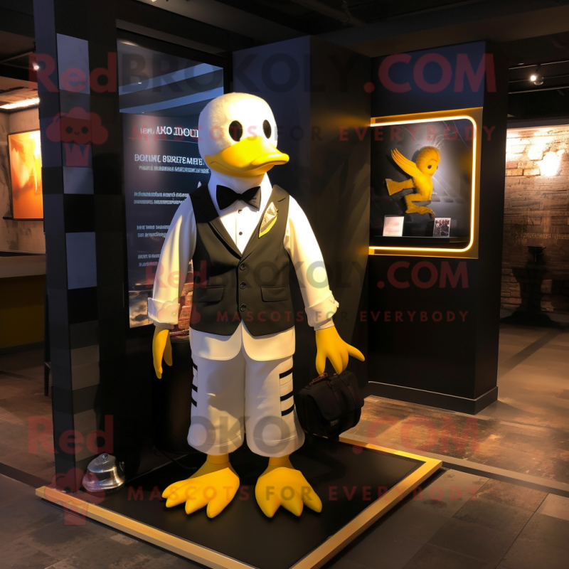 Yellow Goose mascot costume character dressed with a Tuxedo and Backpacks