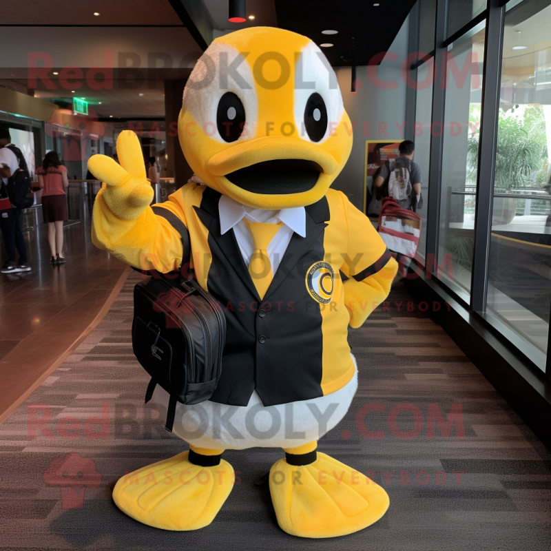 Yellow Goose mascot costume character dressed with a Tuxedo and Backpacks Yellow Goose mascot costume character dressed with a Tuxedo and Backpacks