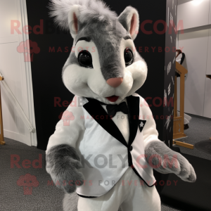 Silver Squirrel mascot costume character dressed with a Tuxedo and Hair clips