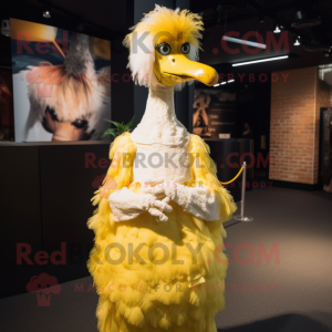 Yellow Ostrich mascot costume character dressed with a Wedding Dress and Headbands