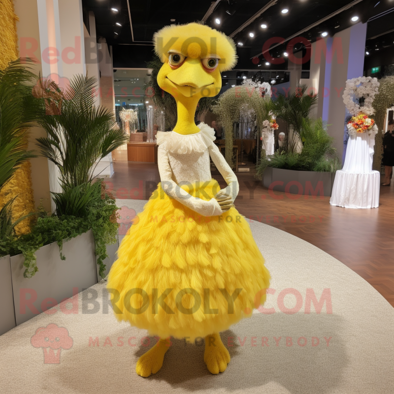 Yellow Ostrich mascot costume character dressed with a Wedding Dress and Headbands Yellow Ostrich mascot costume character dressed with a Wedding Dress and Headbands