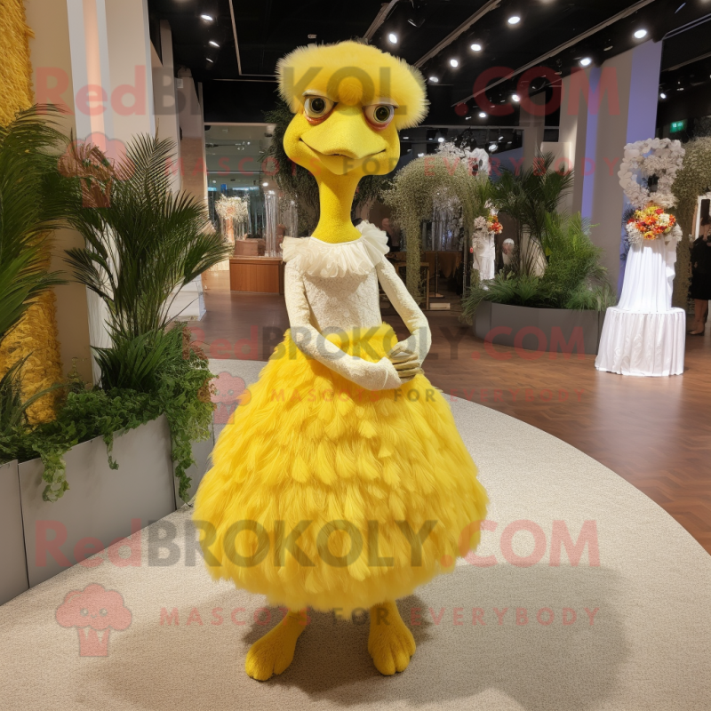 Yellow Ostrich mascot costume character dressed with a Wedding Dress and Headbands