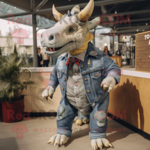 Cream Triceratops mascot costume character dressed with a Denim Shirt and Tie pins