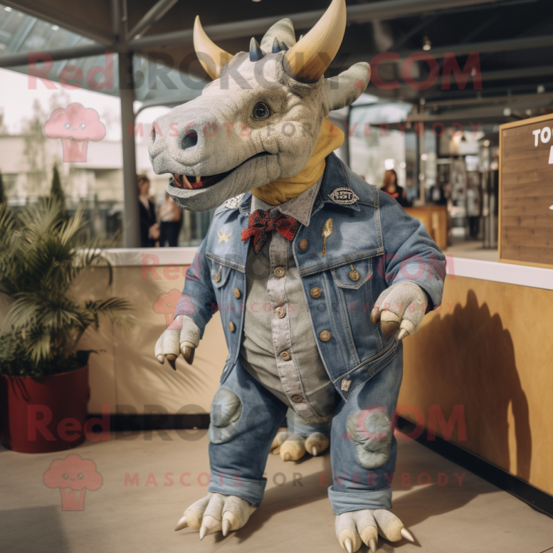 Cream Triceratops mascot costume character dressed with a Denim Shirt and Tie pins