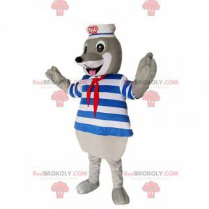 Mascotte de phoque gris avec un maillot et un chapeau de marin