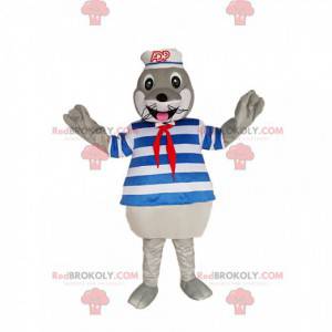 Mascotte de phoque gris avec un maillot et un chapeau de marin