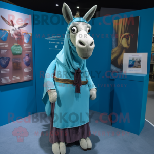 Turquoise Donkey mascot costume character dressed with a Dress Shirt and Shawls