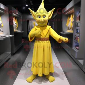Yellow Elf mascot costume character dressed with a Empire Waist Dress and Belts