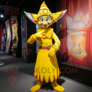 Yellow Elf mascot costume character dressed with a Empire Waist Dress and Belts