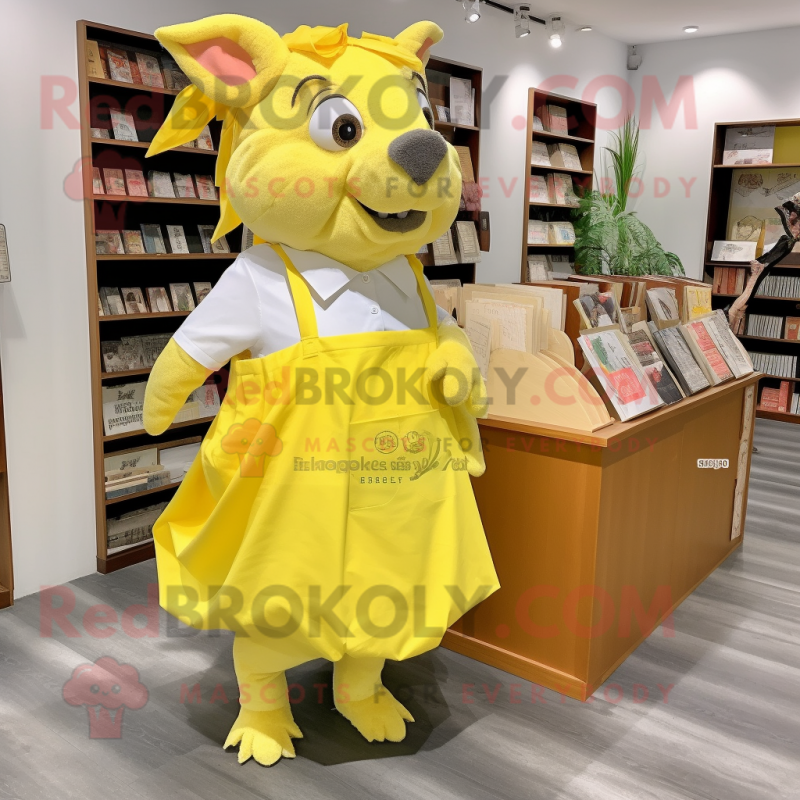 Lemon Yellow Wild Boar mascot costume character dressed with a Wrap Skirt and Tote bags