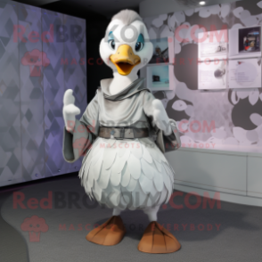 Silver Goose mascot costume character dressed with a Skirt and Belts