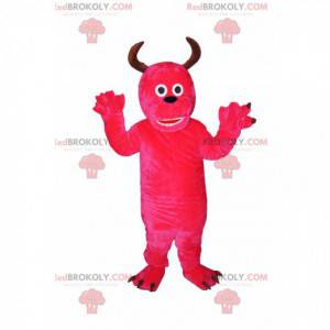 Mascotte de monstre fushia enjoué avec des cornes -