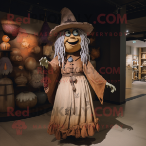 Tan Witch mascot costume character dressed with a Dress and Brooches