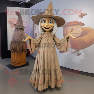 Tan Witch mascot costume character dressed with a Dress and Brooches