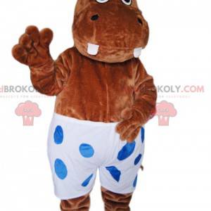 Mascot brown hyppopotamus with a white swimsuit with polka dots