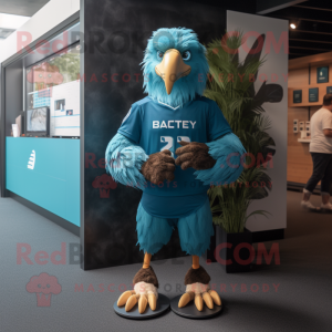 Cyan Haast'S Eagle mascot costume character dressed with a Rugby Shirt and Smartwatches