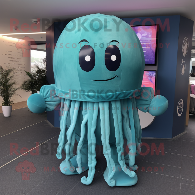 Teal Jellyfish mascot costume character dressed with a Playsuit and Wraps Teal Jellyfish mascot costume character dressed with a Playsuit and Wraps