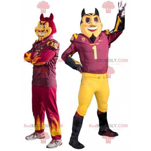 2 mascots of red and black devils looking devilish -