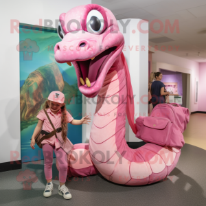 Pink Anaconda mascot costume character dressed with a Mom Jeans and Messenger bags