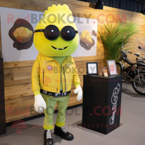 Lemon Yellow Celery mascot costume character dressed with a Biker Jacket and Tie pins