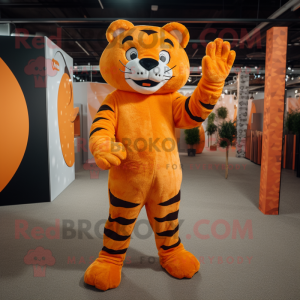 Orange Tiger mascot costume character dressed with a Jumpsuit and Foot pads