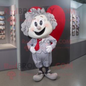 Silver Heart mascot costume character dressed with a Shorts and Pocket squares