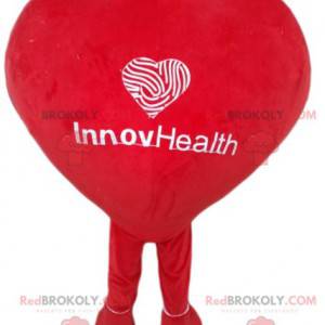 Maskot bílé srdce s úsměvem s červenými pruhy - Redbrokoly.com
