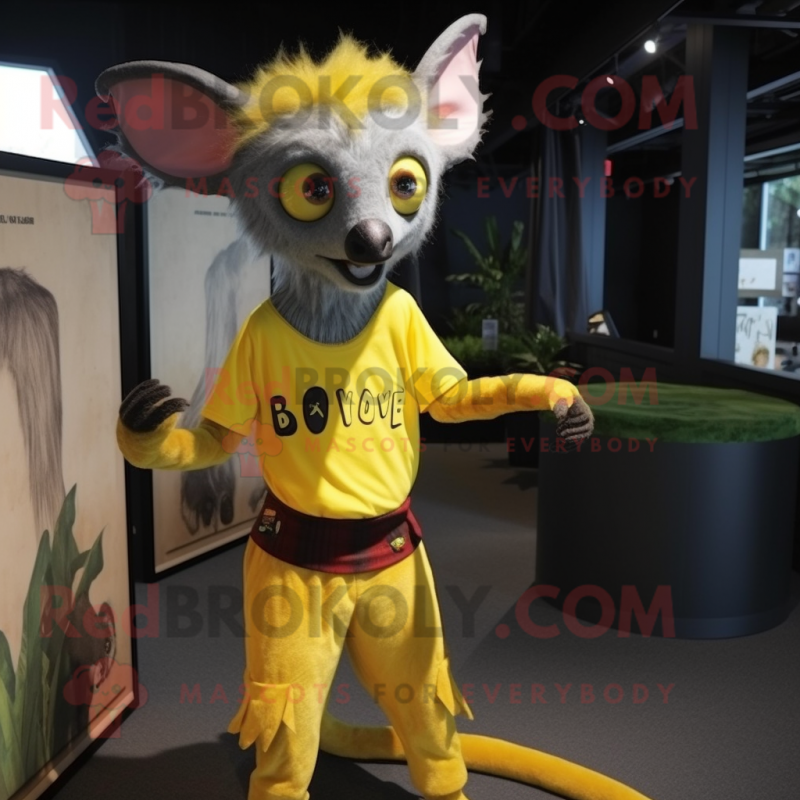 Yellow Aye-Aye mascot costume character dressed with a T-Shirt and Belts