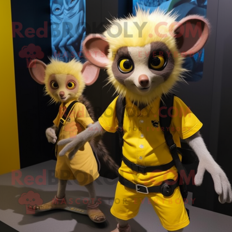 Yellow Aye-Aye mascot costume character dressed with a T-Shirt and Belts