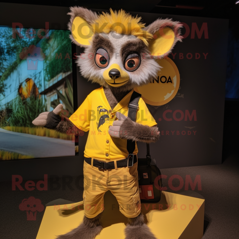 Yellow Aye-Aye mascot costume character dressed with a T-Shirt and Belts