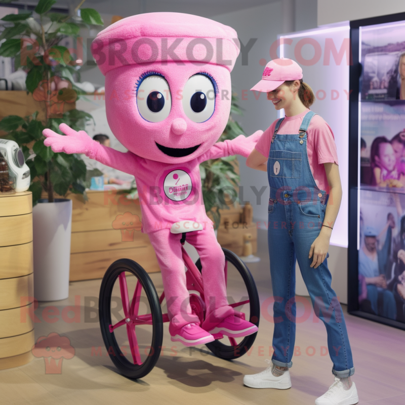 Pink Unicyclist mascot costume character dressed with a Mom Jeans and Hats Pink Unicyclist mascot costume character dressed with a Mom Jeans and Hats