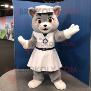 Gray Bobcat mascot costume character dressed with a Circle Skirt and Berets