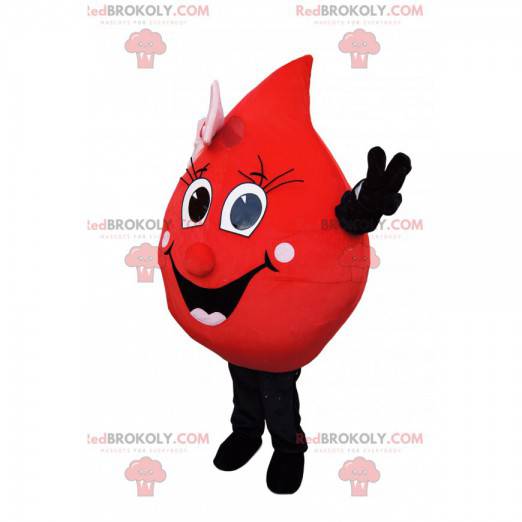 Red drop mascot with a wide smile and a pink bow -
