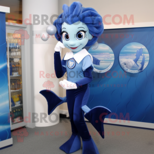 Navy Mermaid mascot costume character dressed with a Dress Pants and Keychains