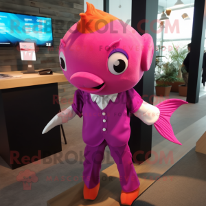 Magenta Goldfish mascot costume character dressed with a Poplin Shirt and Lapel pins