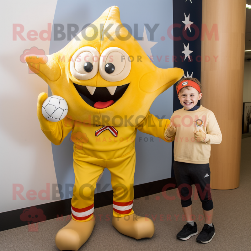 Gold Starfish mascot costume character dressed with a Rugby Shirt and Ties