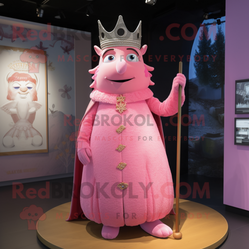 Pink King mascot costume character dressed with a Empire Waist Dress and Earrings Pink King mascot costume character dressed with a Empire Waist Dress and Earrings