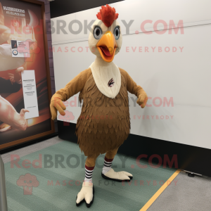 Tan Pheasant mascot costume character dressed with a Running Shorts and Anklets