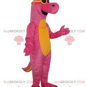 Mascote dinossauro rosa e amarelo com óculos de sol -