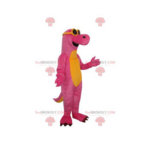 Mascote dinossauro rosa e amarelo com óculos de sol -